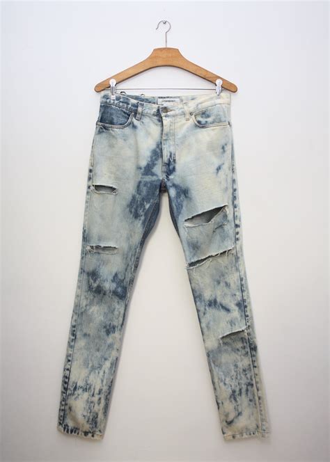 yves saint laurent ripped jeans|ysl jeans farfetch.